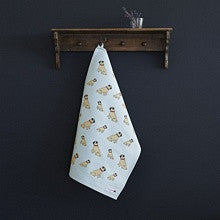 Organic cotton tea towel covered in pugs form Sweet William Designs.