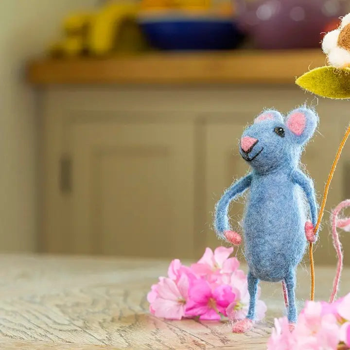 Blue Mouse Holding A Flower