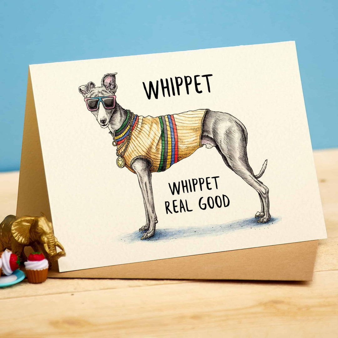 Whippet Greetings Card by Bewilderbeest.