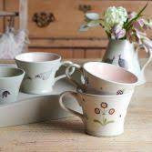Susie Watson pottery Dark Red Auricula Conical Mug. 