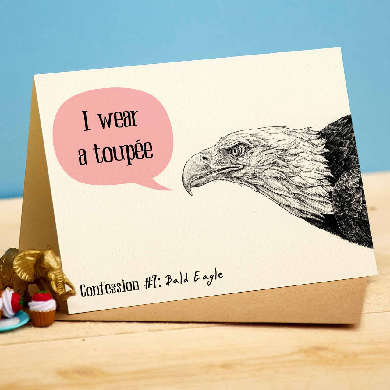 I Wear A Toupee  Greetings Card by Bewilderbeest.