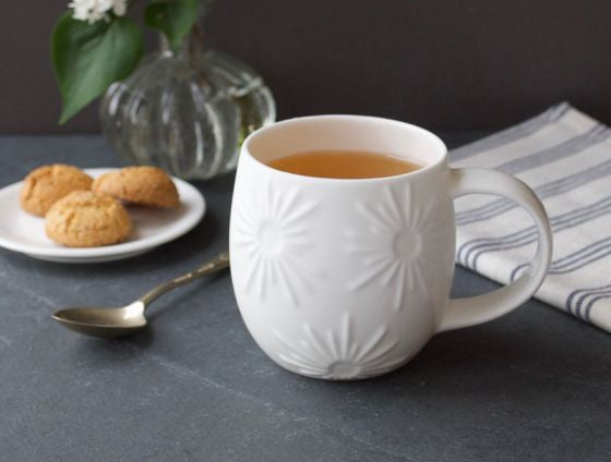 Repeat Repeat's White Bone China Plum mug. Made in England.