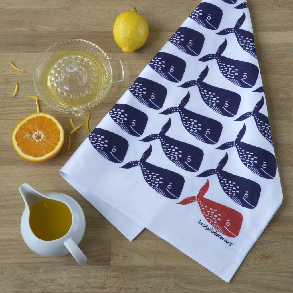 Whale tea towel with design from the original lino print artwork from Lucky Lobster Art in England.