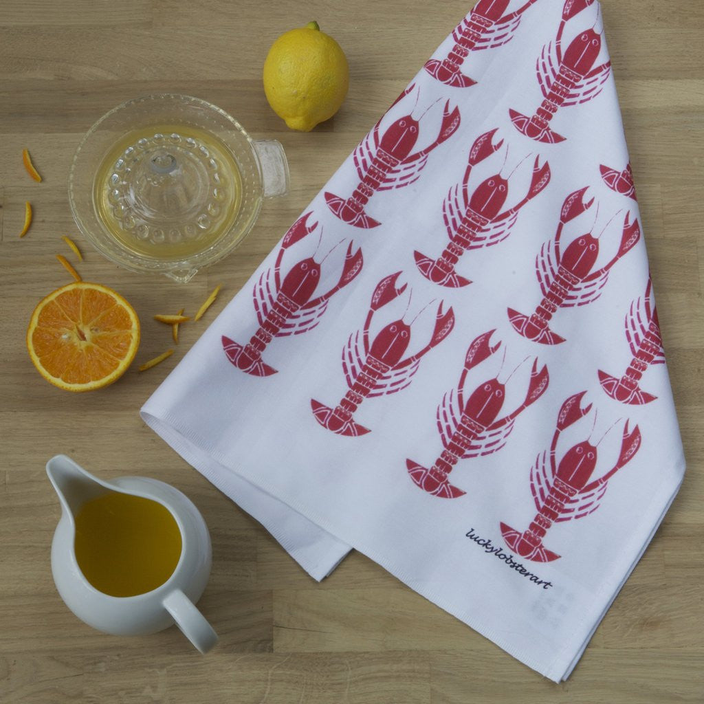 Lobster tea towel with design from the original lino print artwork from Lucky Lobster Art in England.