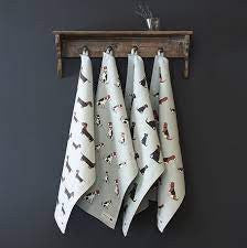 Organic cotton tea towel covered in Jack Russells from Sweet William Designs.