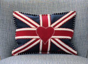 Navy Blue Union Jack crunch pure wool pillow from British designer Jan Constantine. Image