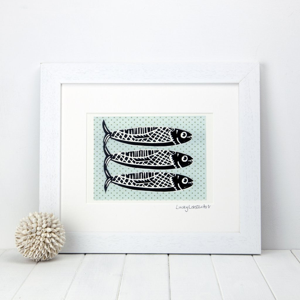 Framed Omega Fish print taken from the original lino print artwork from Lucky Lobster Art in England.