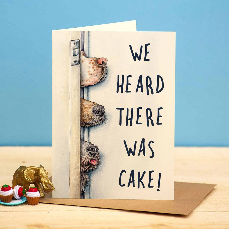 Heard There Was Cake Greetings Card by Bewilderbeest.