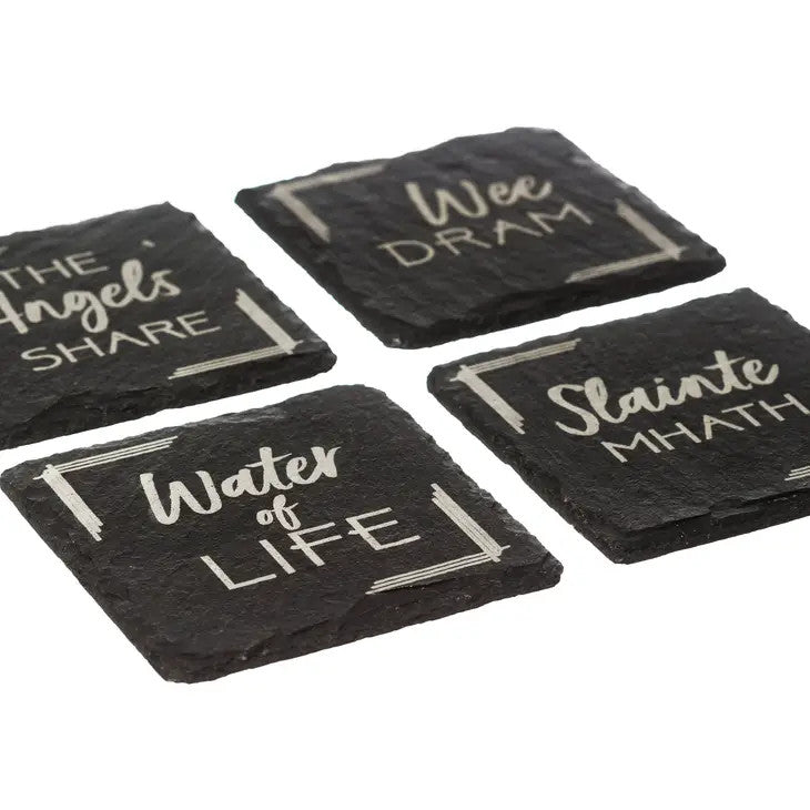 Whisky set of 4 slate coasters with each coaster featuring a different design: "A Wee Dram", "Slainte Mhath", "The Angels Share" and "Water of Life" by Selbrae House. 