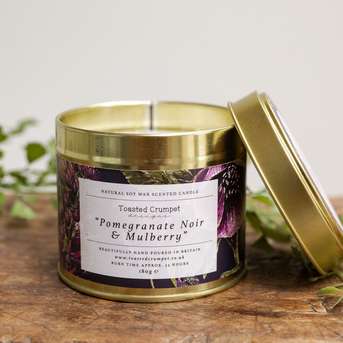 Pomegranate Noir Candle in a Matt Gold Tin by Toasted Crumpet.
