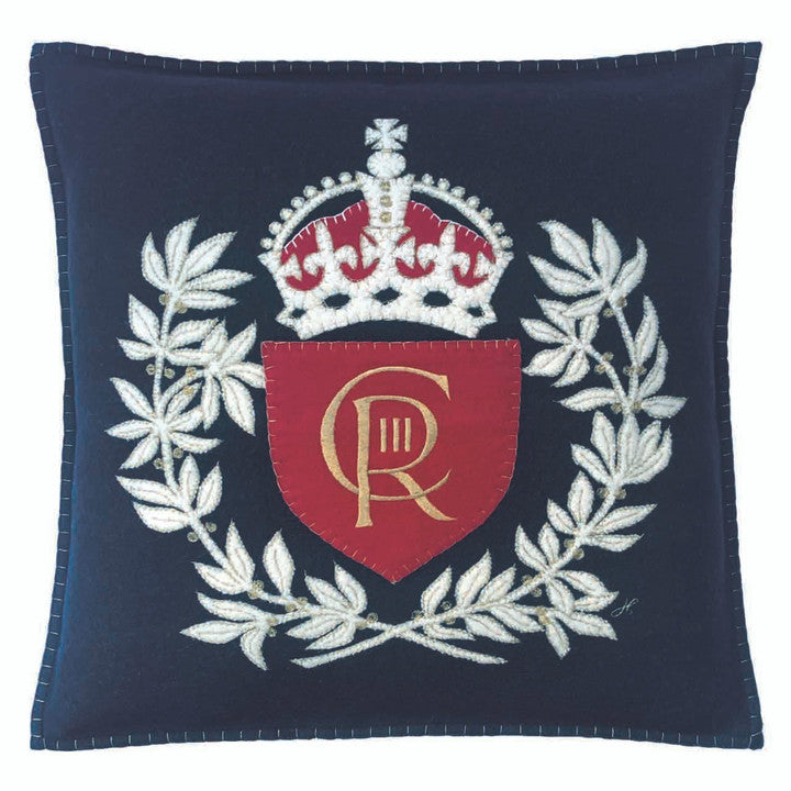 Jan Constantine Coronation Crown & Heart Wreath hand-embroidered felt cushion in navy.