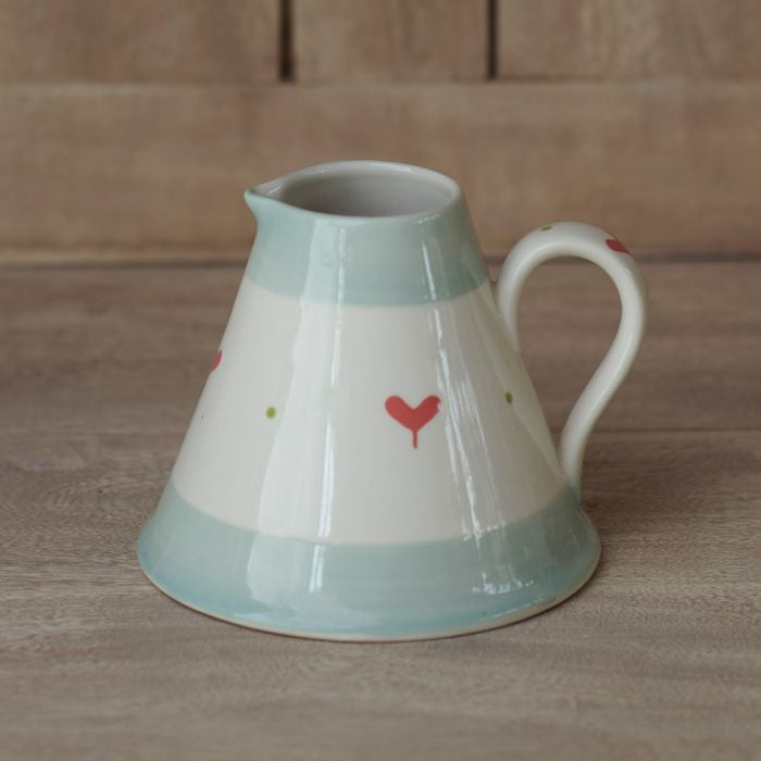 Susie Watson pottery Oscar baby Pitcher. 