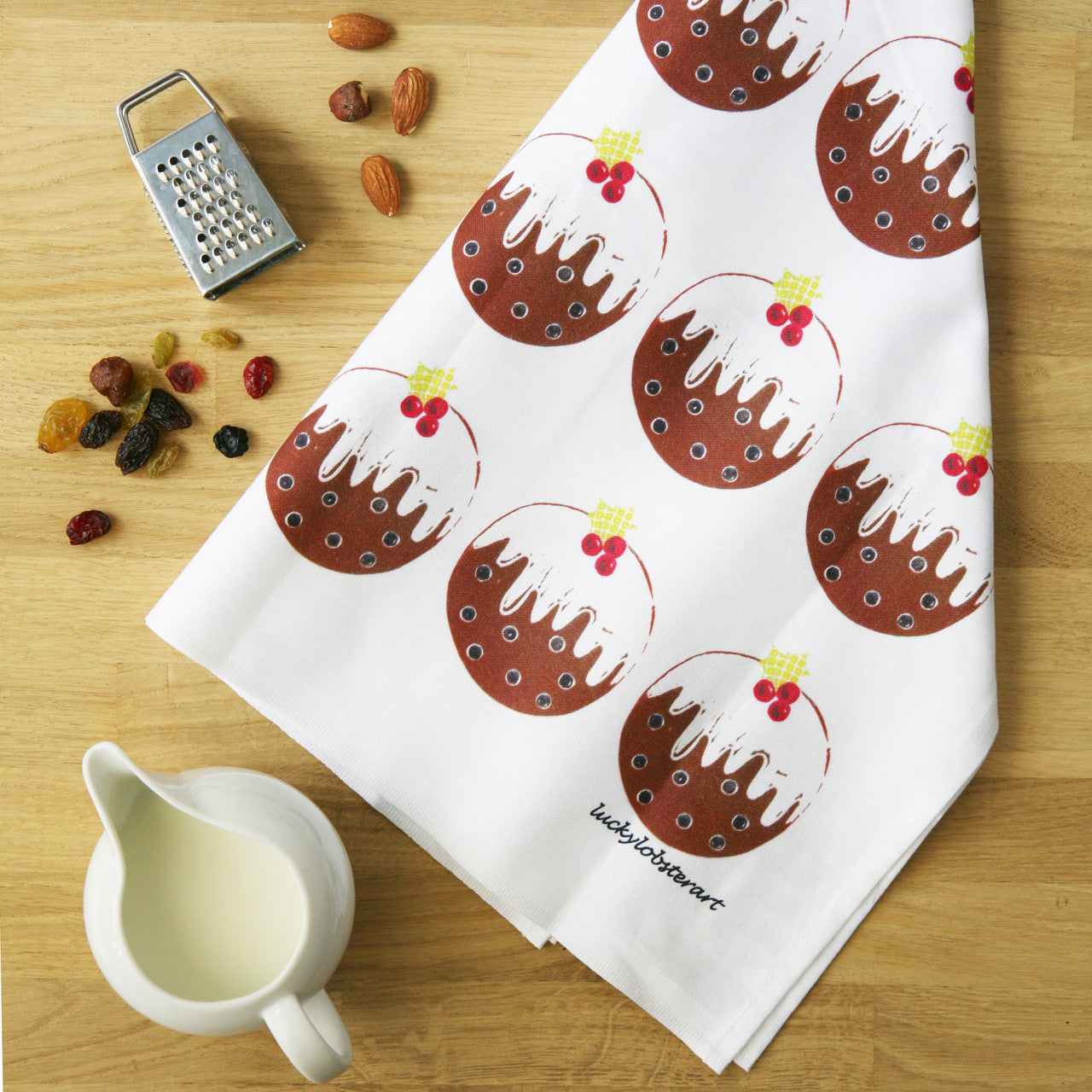 100% cotton Christmas pudding tea towel from British designer Lucky Lobster Art.