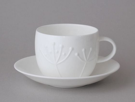 Repeat Repeat's White Bone China Plum Sprig Teacup & Saucer. Made in England.