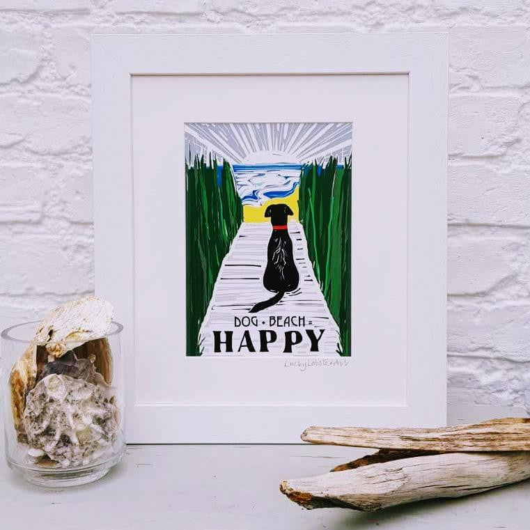 Framed Dog + Beach = Happy print taken from the original lino print artwork from Lucky Lobster Art.