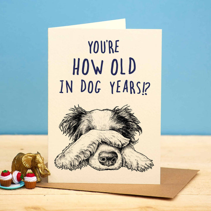 You're How Old in Dog Years Greetings Card by Bewilderbeest.