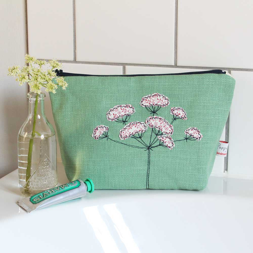 Embroidered lined make up bag by Poppy Treffry.